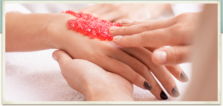 Raspberry sugar scrub on hands