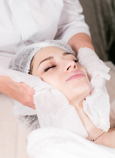 Woman enjoying a Classic Facial