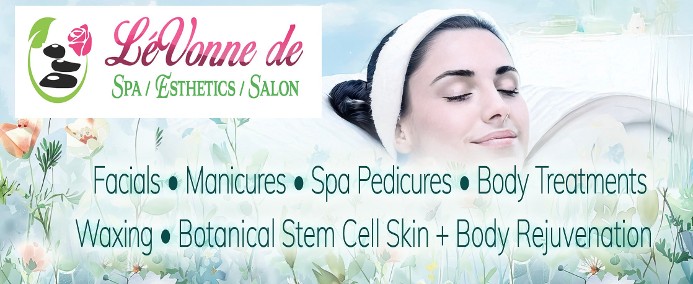 Spa woman in field flowers 